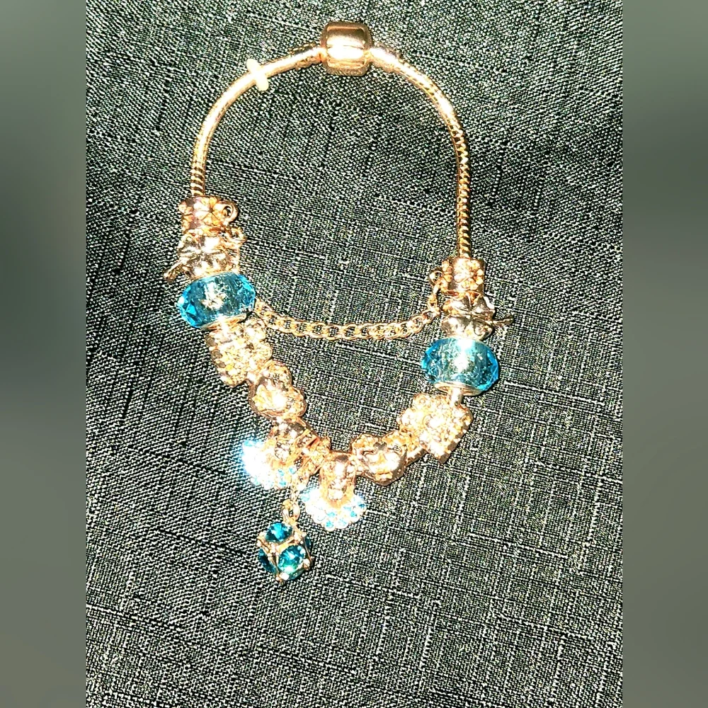 Blue and Gold Multi-Strand Bracelet with Beaded Accents. ITEM No. 19-147